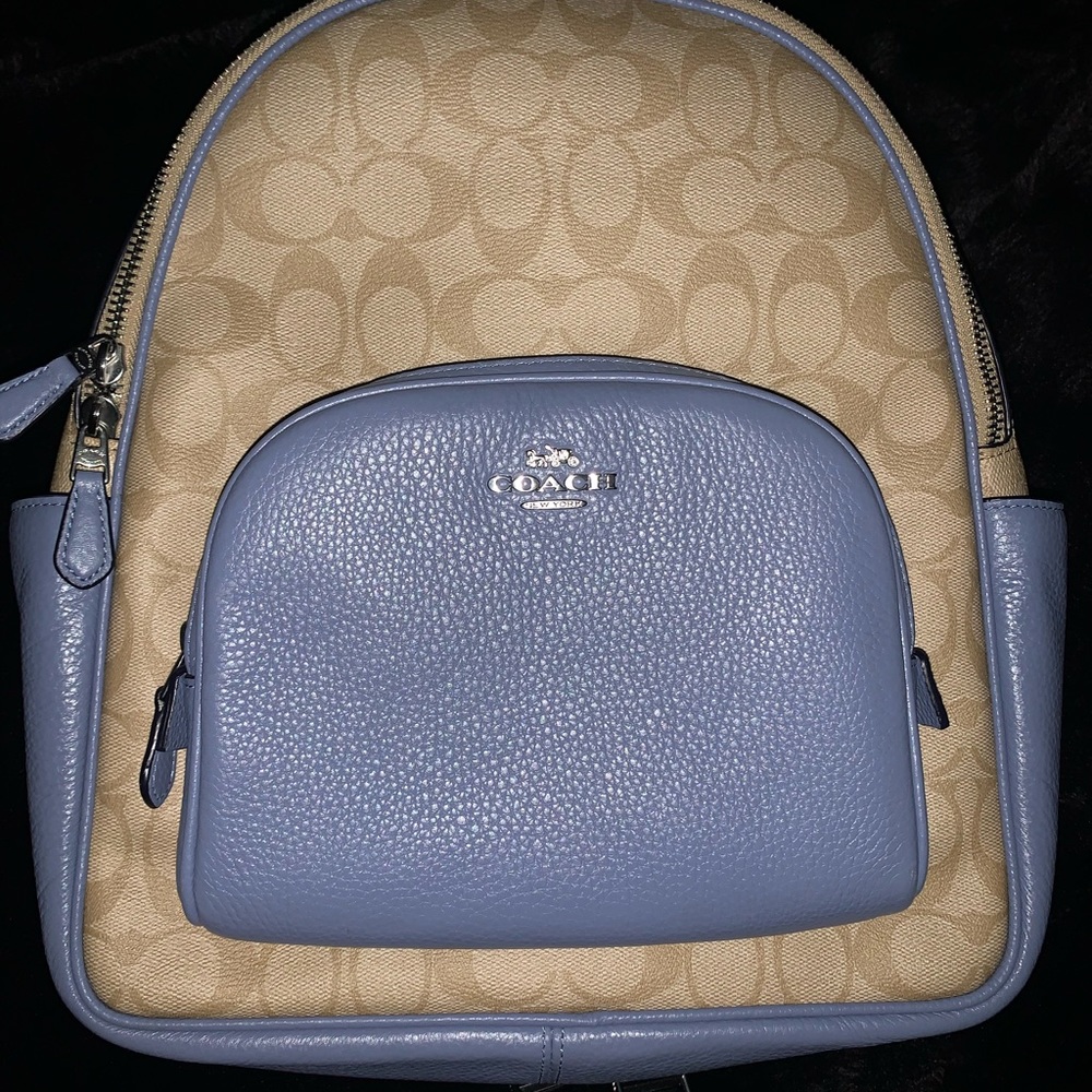 Sky Blue and Tan leather COACH backpack.